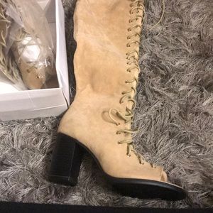 Knee high open toe laced boots